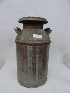 lot 29 image: Vintage cream can