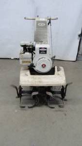 lot 43 image: Tiller Gilson 5 hp Briggs & Stratton 206 cc pulls over