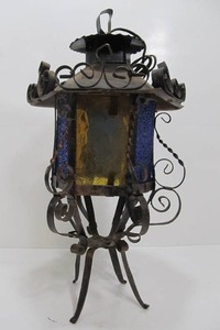 lot 70 image: Vintage Spanish Style Scrolled Iron Hanging or Standing Lantern Lamp