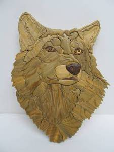 lot 188 image: Hand Made Folk Art Multi Type Wood Wolf Wall Sculpture