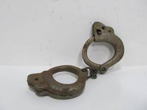 lot 317 image: Vintage Cast Iron Childs Toy Handcuffs JP Co New York