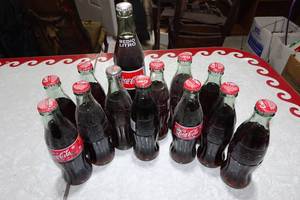 lot 156 image: Assorted Glass Coke Bottles - Half Liter from Mexico, Santa Labels