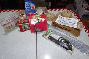 lot 97 image: Assorted Home Hardware - Christmas Door Stop, Patio Door Handle Set