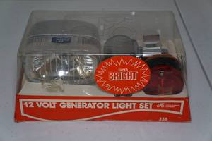 lot 12 image: Unused Vintage Cycle Products 12 Volt Generator Bicycle Light Set