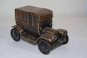 lot 21 image: Vintage Banthrico 1912 Packard Coin Bank