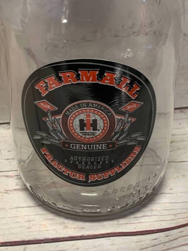 lot 2 image: 1 Quart Farmall IH Glass Oil Bottle
