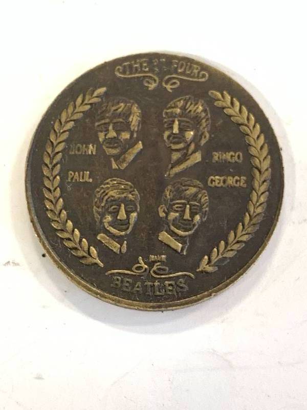 lot 12 image: 1964 Beatles Brass Token