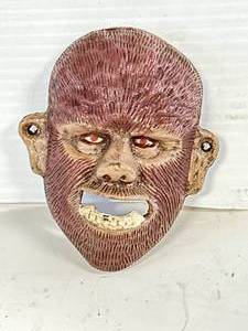 lot 34 image: Cast Iron Werewolf Bottle Opener