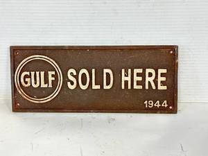 lot 41 image: Gulf Sold Here 1944 Cast Iron Sign 4x11 Inch