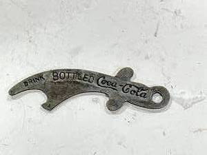 lot 65 image: Drink Coca Cola Bottle Opener Sword 3 Inch Tall