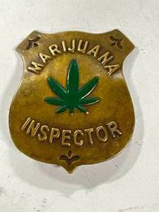 lot 69 image: Marijuana Inspector Badge