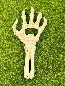 lot 72 image: Skeleton Cast Iron Bottle Opener 6  Inch Long