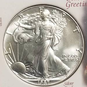 1987 AMERICAN SILVER EAGLE IN CHRISTMAS CASE