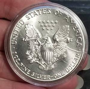 1988 AMERICAN SILVER EAGLE 1 TROY OZ .999 FINE SILVER IN AIRTITE