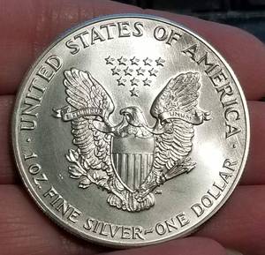 1986 AMERICAN SILVER EAGLE 1 TROY OZ .999 FINE SILVER DOLLAR