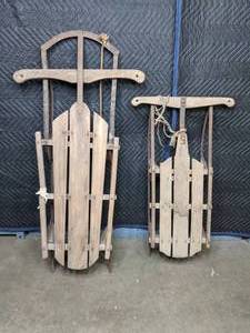 lot 191 image: Pair of Vintage Sleds X