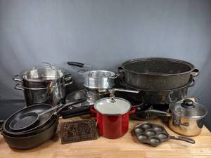 lot 180 image: A Variety of Pots and Pans, Including Nuwave Stainless Steel Pot, Grand Gourmet Pot, Farberware, Circulon, New Mainstays 3-Piece Skillet Set, Cast Iron Muffin Pan and More  M