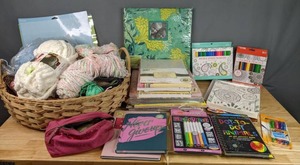 lot 217 image: Arts and Craft Lot Yarn and Fabric in a Basket, Scrapbooking Supplies, Colored Pencils and Markers, Coloring Books, and Much More  M