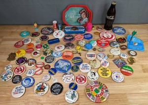 lot 247 image: Collection of Vintage Buttons and Pins, Coca Cola Tin Tray, Coke Bottle, Mini Cola and Sprint Cans, and More  M