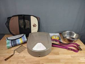 lot 249 image: PetSafe 5 Meal Automatic Pet Feeder, Striped Picnic Blanket, 4 Ft. Maroon Leash, Foldable Pet Crate and More M