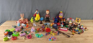 lot 227 image: Vintage Toy Collection Furby, Giga Pets, Tamagotchis, Porcelain Snow White, Lee Dungarees Buddy Figurine, Disney Characters and More  M