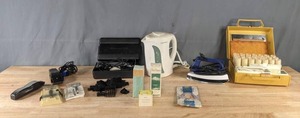 lot 260 image: Mixed Lot Hair Clippers by Wahl & Remington, Razors, Vintage Electric Brother Hair Curlers, Proctor Silex Water Boiler, Clothes Iron, Vintage Toiletries, and More  M