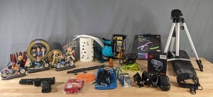 lot 261 image: Mixed Lot  Elvis Collectibles (Pez, Bears and More), Marksman Repeater BB Pistol, Pocket Fishing Rod, YakTrax, Digital Concepts TR-10 Tripod, FOBOS Webcam, Sunglasses, and Much More  M