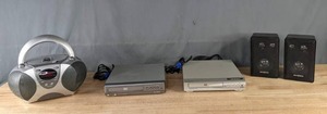 lot 263 image: AV Lot  Portable RadioCD Player Combo, Symphonic DVD Player, Magnavox DVD Player, Pair of Insignia  4 3-Way Surround Sound Speakers  M