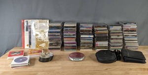 lot 268 image: Durabrand CD Player with Large Assortment of CDs Broadway, Madonna, Kiss, Hall & Oates, and Many More  M