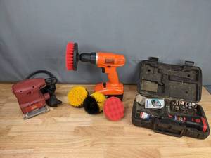 lot 280 image: Tool Shop Finishing Sander, Black & Decker Cordless Drill with Brushes, Dremel Cordless Rotary Tool M