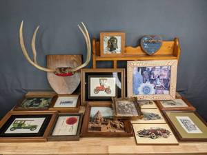 lot 315 image: Wall Decor Mounted Antlers, Framed Art (Darth Vader, Vintage Autos, The Witch House by Goff) , Wall Shelf, and More  M