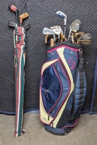 lot 313 image: Two Sets of Golf Clubs and Bags Wilson Hope Breast Cancer Golf Bag, Clubs by Spalding, Northwestern, Pro-Bilt, and More  M