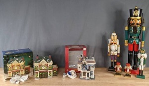 lot 303 image: (2) Collectible Lighted Houses Lemax Watsons Curios & State College, and (5) Nutcrackers  M