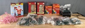 lot 306 image: Inflatable Santa, Star Night Laser Dancers, Multiple Light Sets, Light Gutter Clips  M