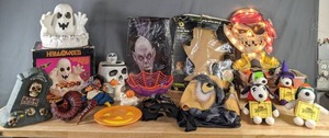 lot 311 image: Halloween Decor Lighted and Motion Activated Items, Snoopy Whitman Collectibles, Pound Puppy, and Much More  M
