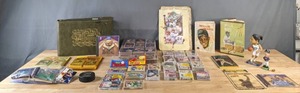 lot 34 image: Large Collection of MLB, NBA, NFL, and NHL Sports Trading Cards, Willie Mays Books, MN Wild Fans Hockey Puck, Bobble Heads and More M