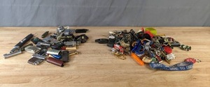 lot 90 image: A Variety of Keychains, Lighters, Lanyards and More  M