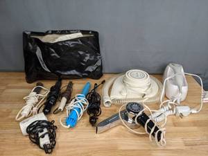 lot 330 image: A Collection of Curling Irons and Hair Dryers  Z
