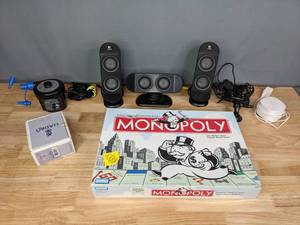 lot 332 image: Monopoly Board Game, Electric Pump, Nativity Lamb and Logitech Speakers  E