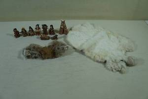 Small Native American Figures with Pelts