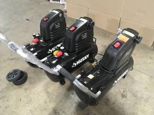 Lot of assorted Husky 8 Gal air compressors open box customer returns