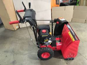 lot 33 image: PowerSmart 24 in. 2-Stage Electric Start Gas Snow Blower with LED Light in Working conditions