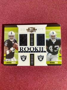 JaMarcus RussellMichael Bush Dual Relic Rookie Card - #d500