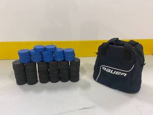 Lot of Hockey Pucks with Bag
