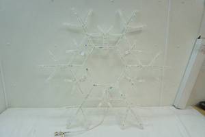 lighted snowflake, lighted swags and bow