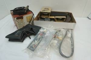 lot 24 image: car stereo, battery charger