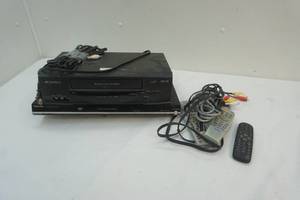 lot 64 image: remotes,dvd player ,vcr player