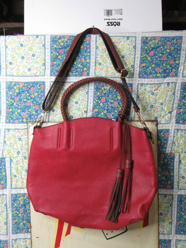 lot 40 image: Kate & Mallory Faux Leather Woven Handle Tassel Detailed Satchel
