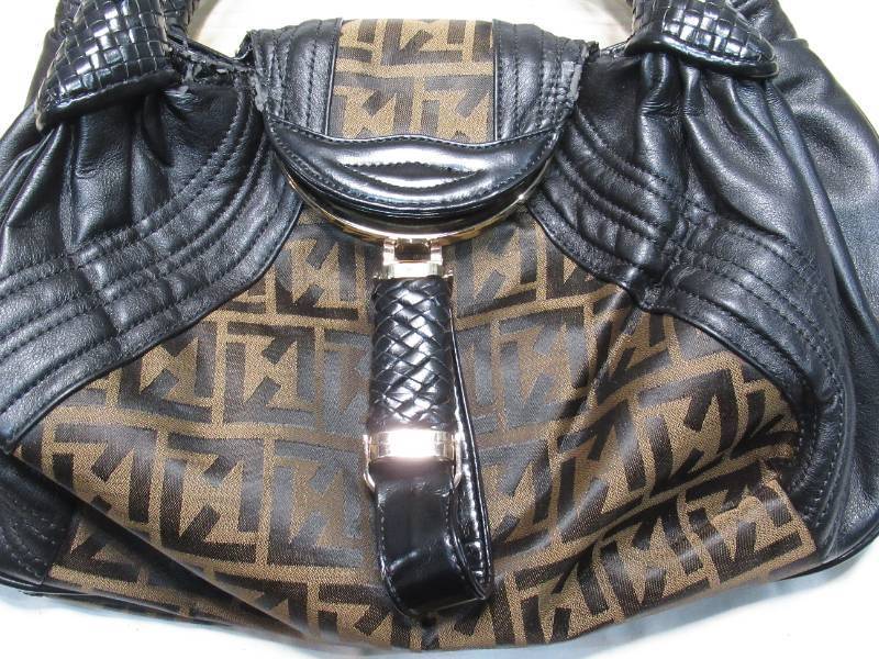 lot 71 image: Brown & Black Leather Purse