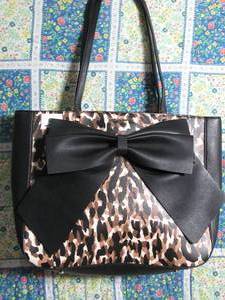 lot 9 image: Karl Lagerfeld Paris Clemence Faux Leather Bow Detailed Zip Top Tote Bag
